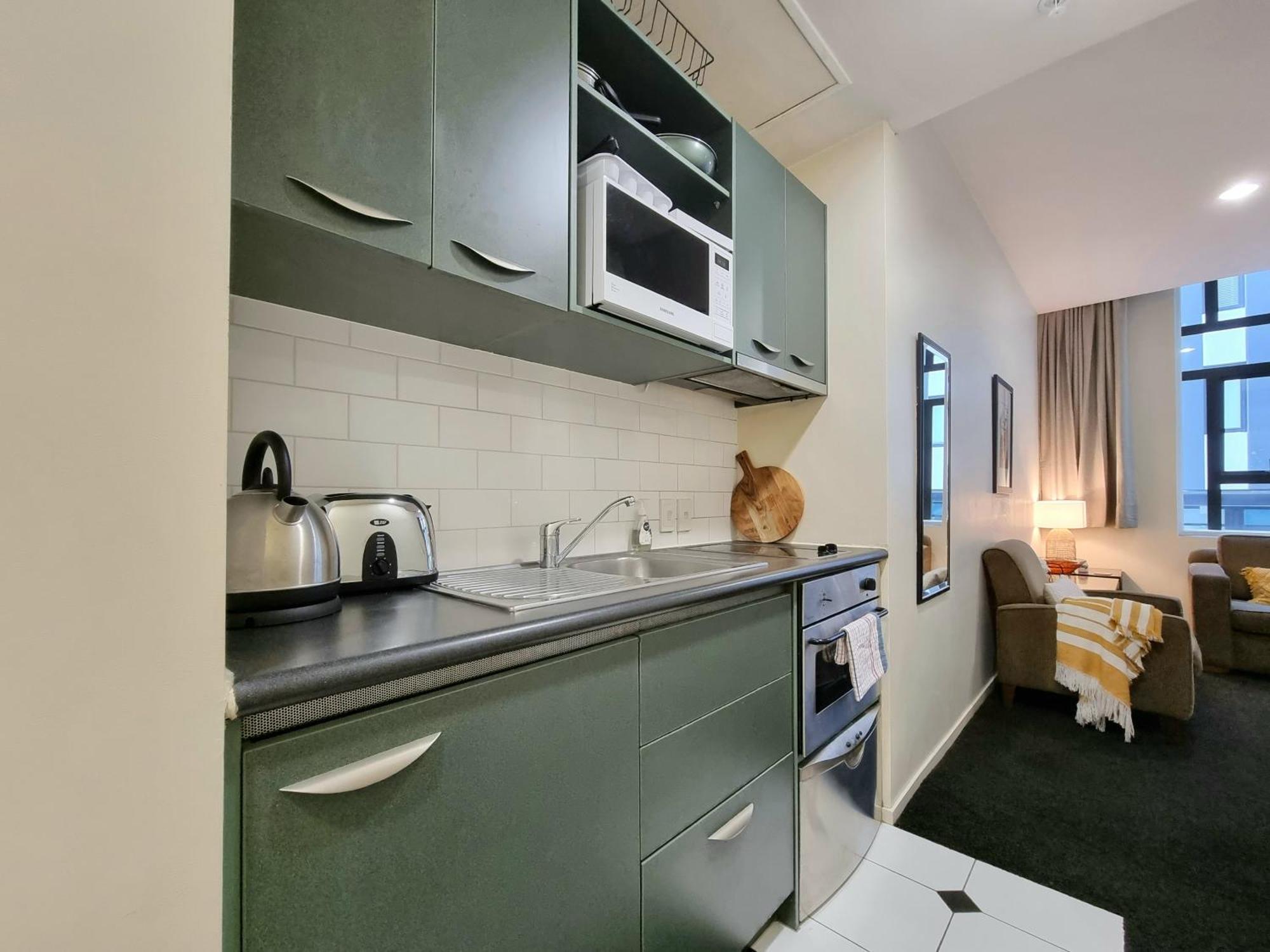 Urban Deco Apartment On Queen Street أوكلاند الغرفة الصورة