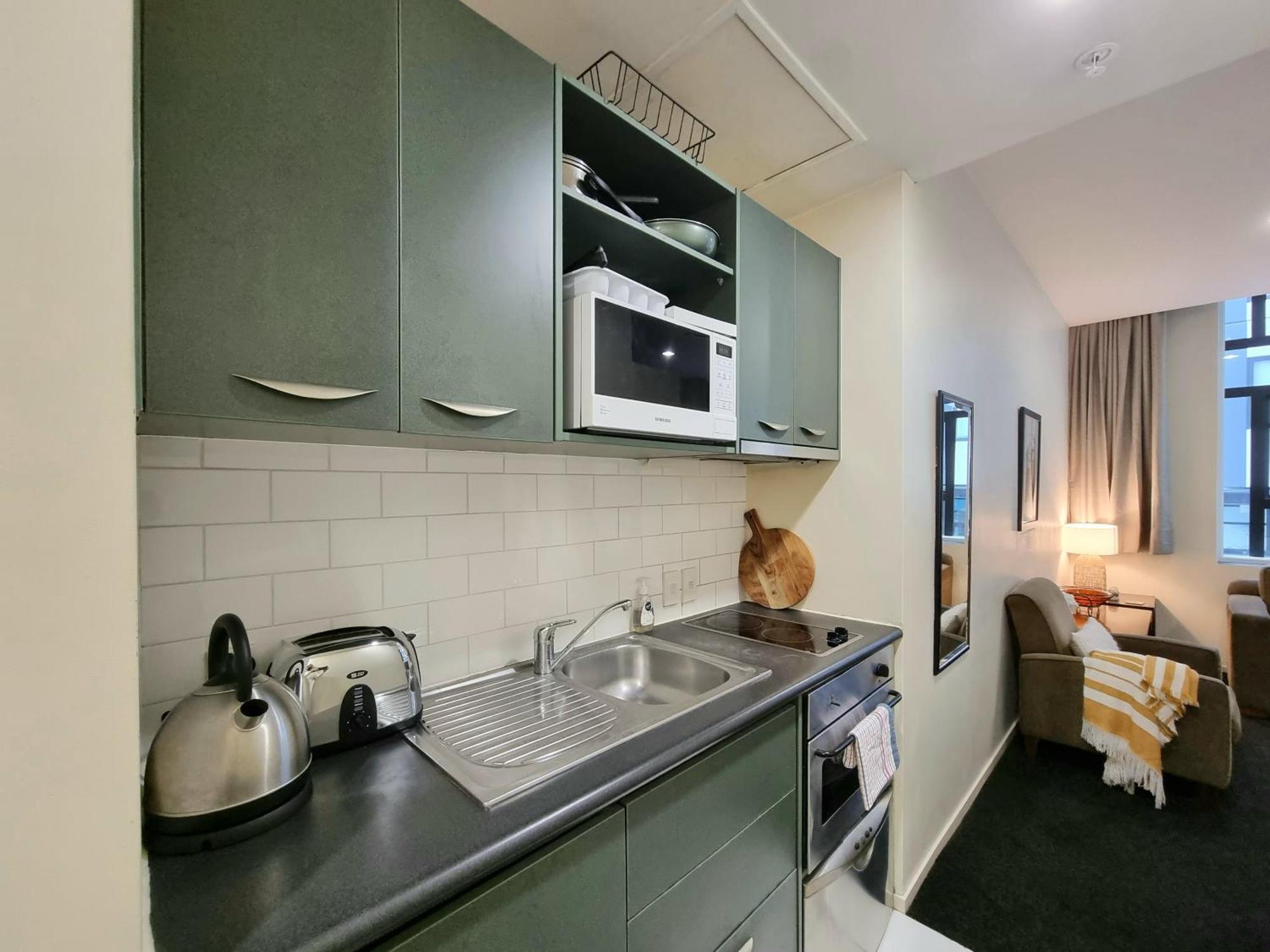 Urban Deco Apartment On Queen Street أوكلاند الغرفة الصورة